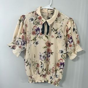 Super cute top! Medium.